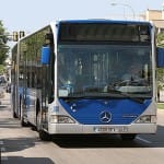 Turistas y autobuses
