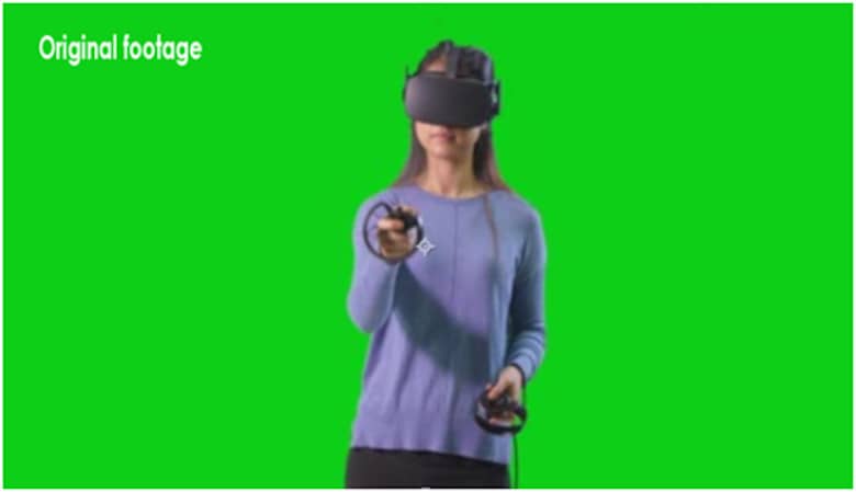 Woman playing vr on green screen